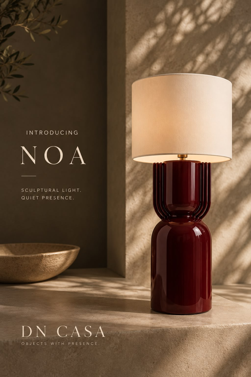 NOA sculptural table lamp in oxblood red