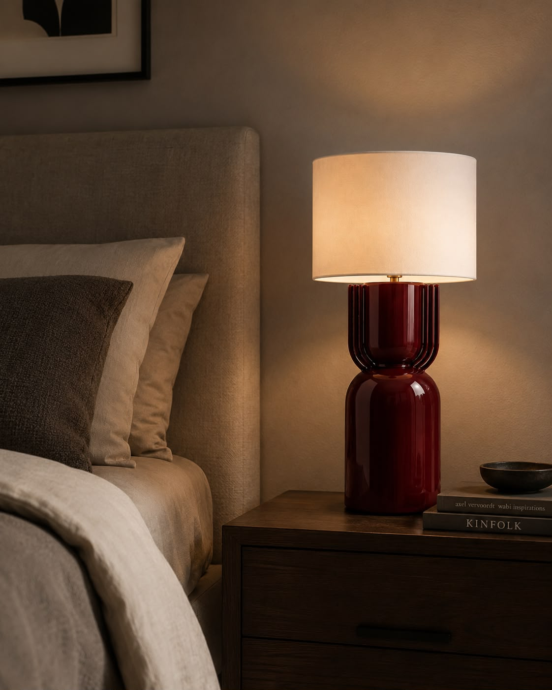 NOA oxblood red table lamp on a bedside table
