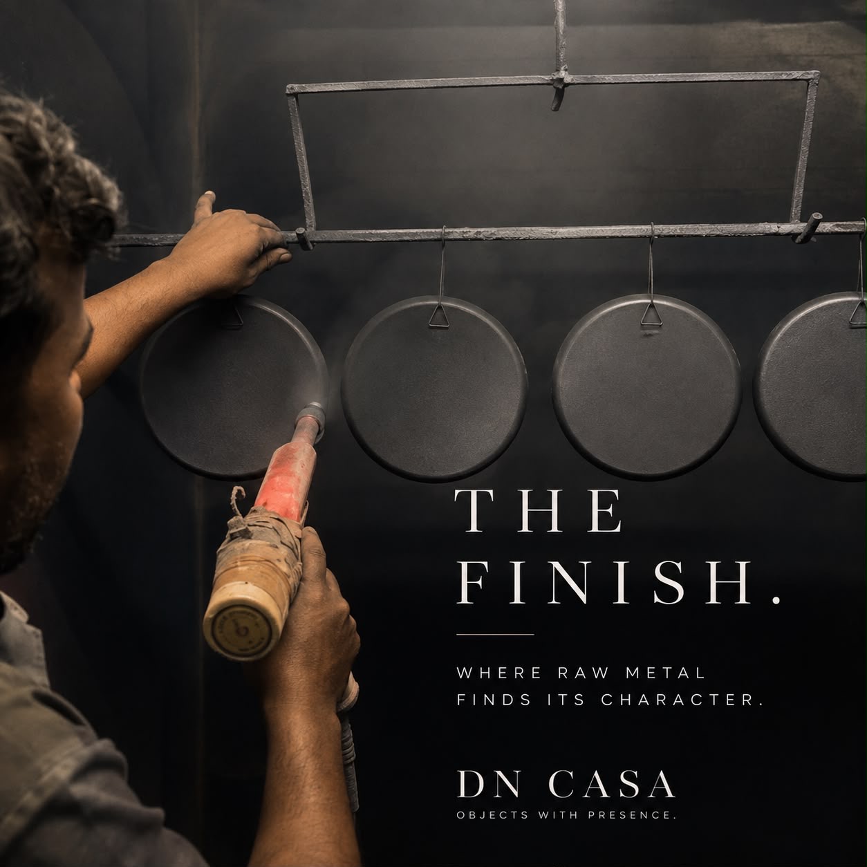 DN CASA artisan finishing a metal object